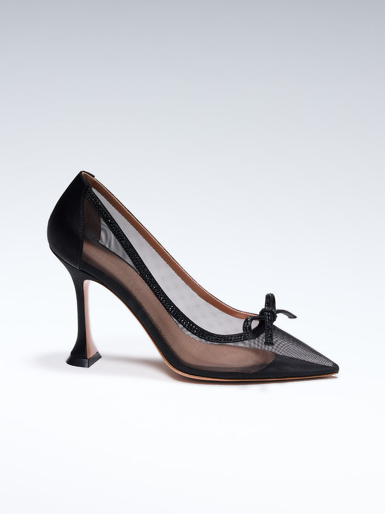 Hand-crafted in Italy, the Cinderella (“Cinderella”) pump features a glossy black satin and is set upon our custom 95mm heel designed for your comfort. Cinderella is accented with our signature mesh upper that gently molds to your foot and features a bold bow that is embellished with glittering Swarovski crystals.