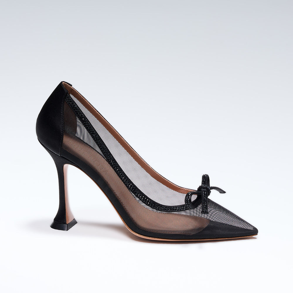 Hand-crafted in Italy, the Cinderella (“Cinderella”) pump features a glossy black satin and is set upon our custom 95mm heel designed for your comfort. Cinderella is accented with our signature mesh upper that gently molds to your foot and features a bold bow that is embellished with glittering Swarovski crystals.