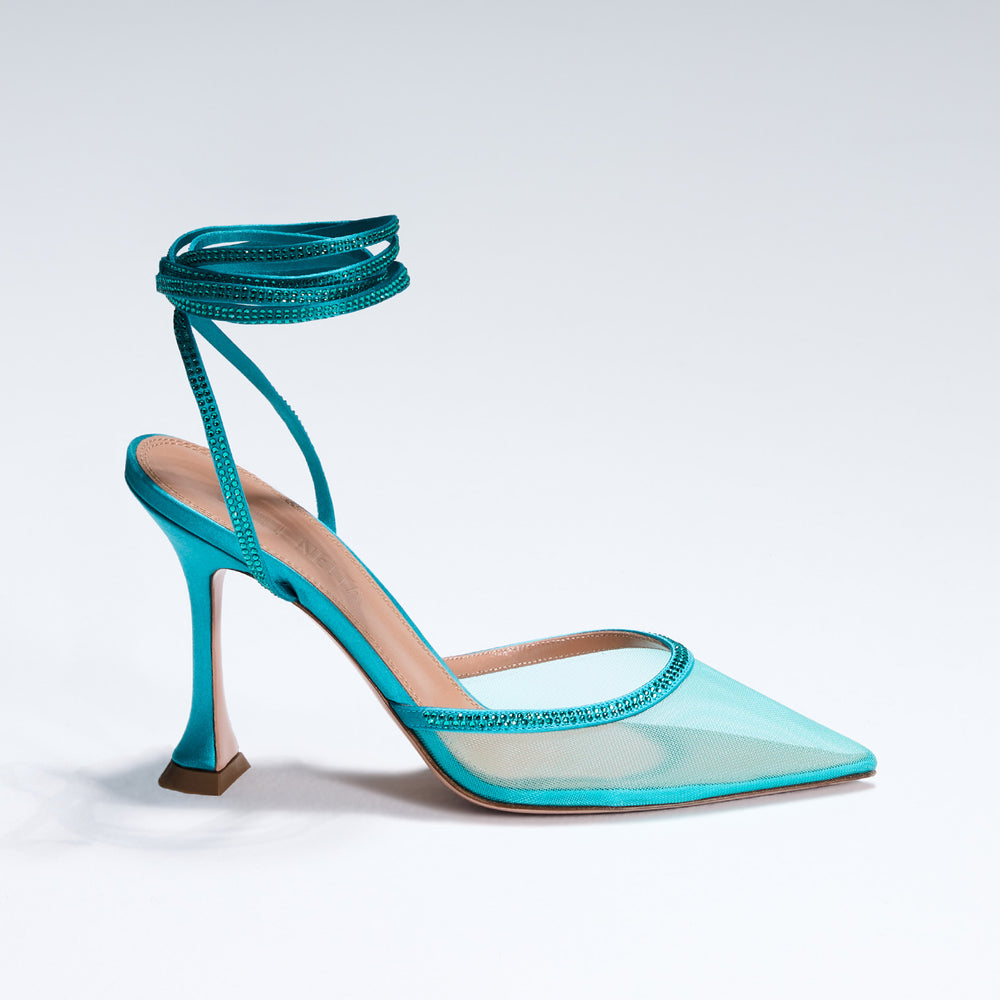 Dani Lace up on Model. TEAL SATIN LACE-UP WITH CRYSTAL EMBELLISHMENT Hand-crafted in Italy, the Dani (“Dani”) lace-up features a glossy teal satin and is set upon our custom 95mm heel designed for your comfort. Dani is accented with our signature mesh upper that gently molds to your foot and is adorned with rows of glistening crystals that wrap around your foot and leg for an irresistible touch of sparkle.